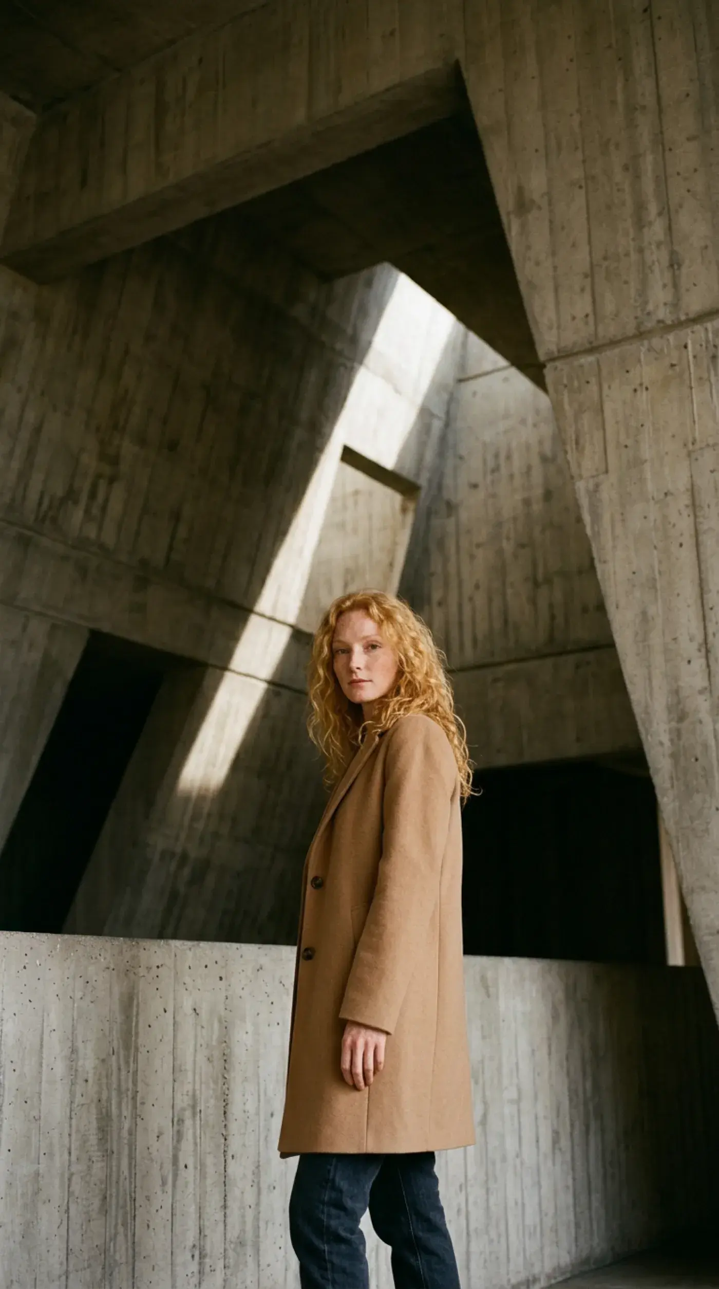 Charlotte at a Brutalist architecture building