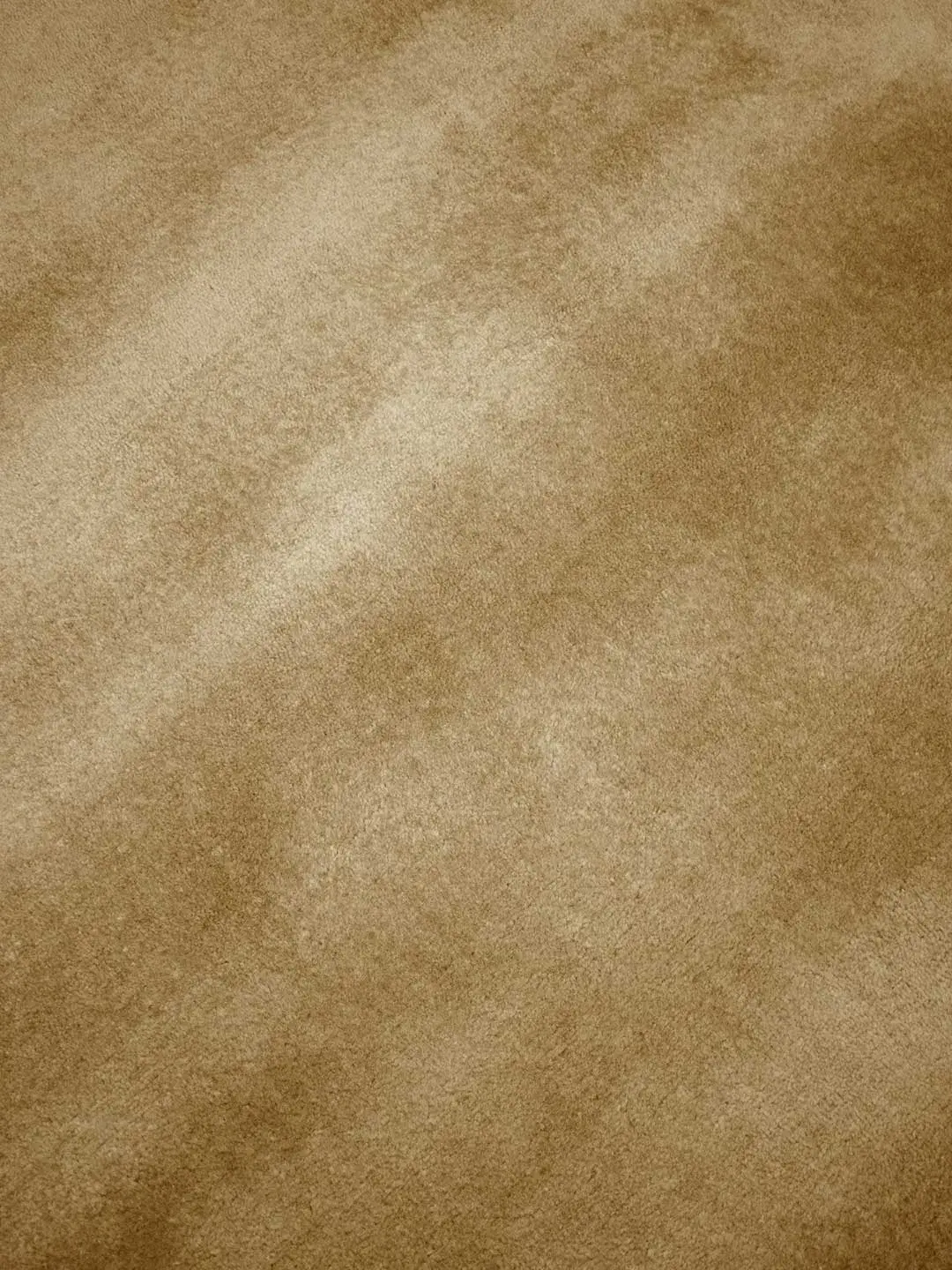 Close-up of Cashmere Caramel rug pile showing the fiber depth and luster