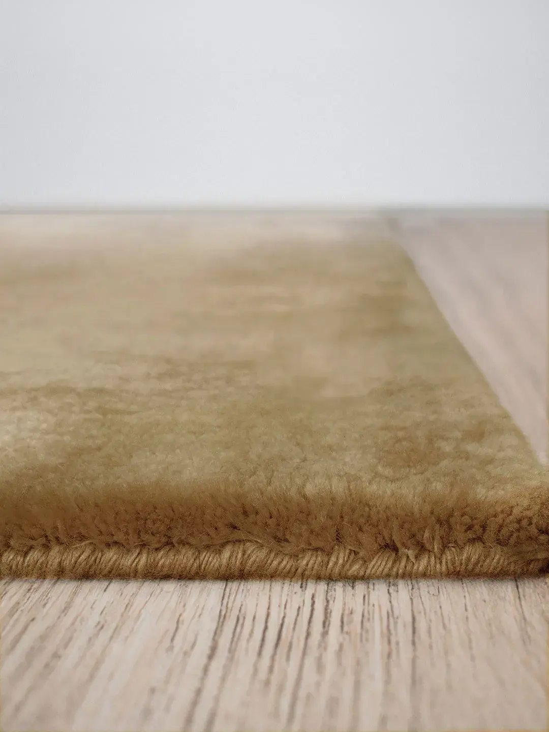Cashmere Caramel rug edge showing pile thickness