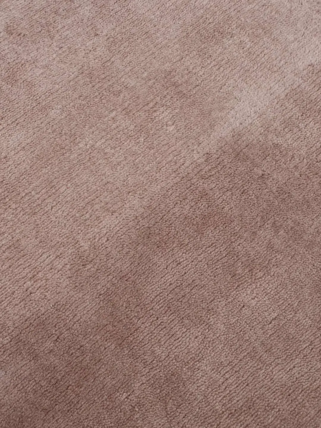 Cashmere Rose rug fold showing softness