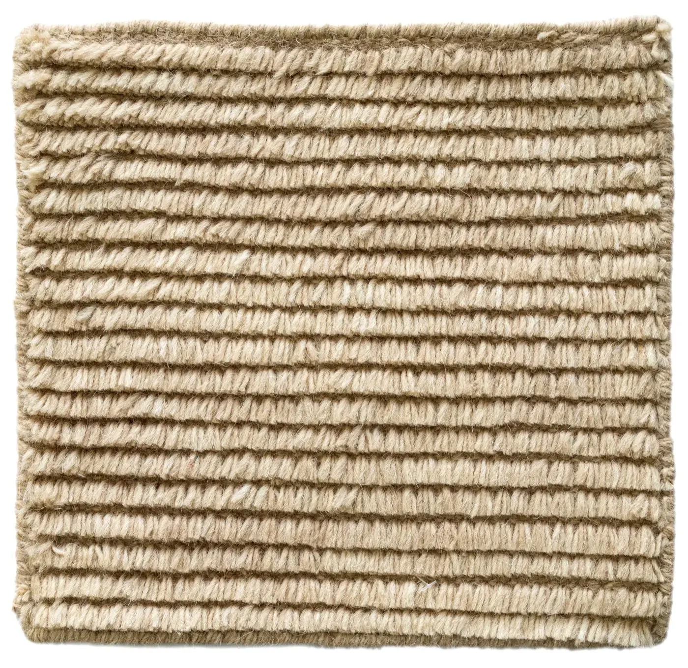 Detail of Nami wool rug in caramel showing natural fiber texture and tight pile