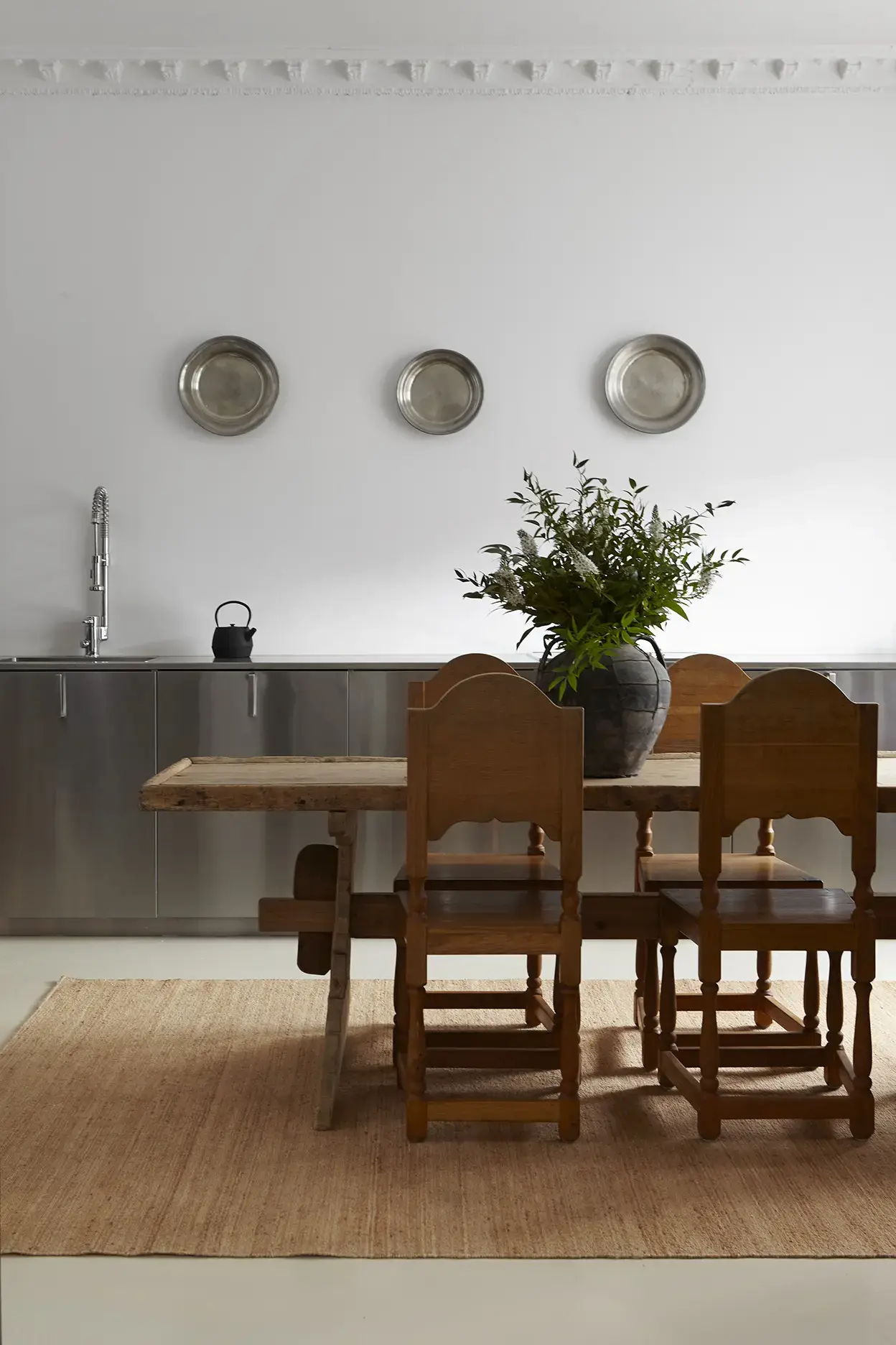 Natural jute rug in warm hallway